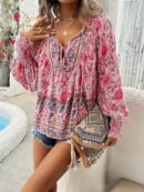 Blusa Floral con Lazada al Cuello y Mangas Farol