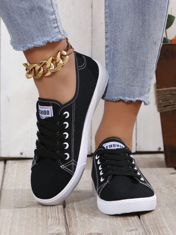 Zapatillas Deportivas de Lona Negra y Blanca, Estilo Universitario