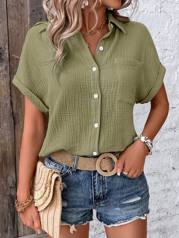 Camisa Azul Marino con Detalles Texturados y Mangas Batwing - Image 25