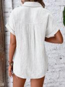 Camisa Azul Marino con Detalles Texturados y Mangas Batwing