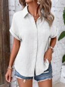 Camisa Azul Marino con Detalles Texturados y Mangas Batwing