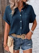 Camisa Azul Marino con Detalles Texturados y Mangas Batwing