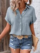Camisa Azul Marino con Detalles Texturados y Mangas Batwing