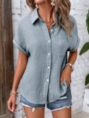 Camisa Azul Marino con Detalles Texturados y Mangas Batwing