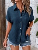 Camisa Azul Marino con Detalles Texturados y Mangas Batwing