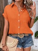 Camisa Azul Marino con Detalles Texturados y Mangas Batwing