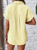 Camisa Azul Marino con Detalles Texturados y Mangas Batwing