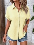 Camisa Azul Marino con Detalles Texturados y Mangas Batwing