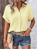 Camisa Azul Marino con Detalles Texturados y Mangas Batwing