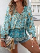 Blusa Floral con Lazada al Cuello y Mangas Farol