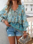 Blusa Floral con Lazada al Cuello y Mangas Farol