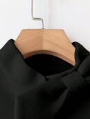 Abrigo Elegante de Color Sólido con Puños de Piel y Lazo Decorativo