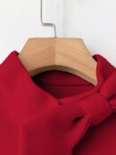 Abrigo Elegante de Color Sólido con Puños de Piel y Lazo Decorativo