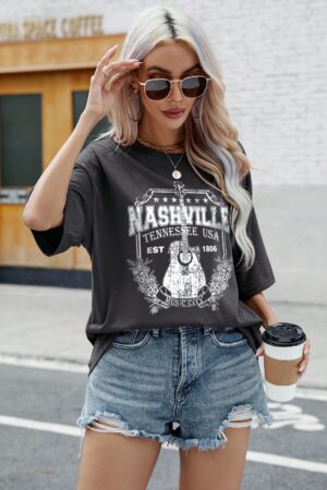 Remera Oversize con Gráfica de Letras y Hombros Caídos