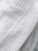 Camisa Larga con Hombros Caídos y Botones Frontales