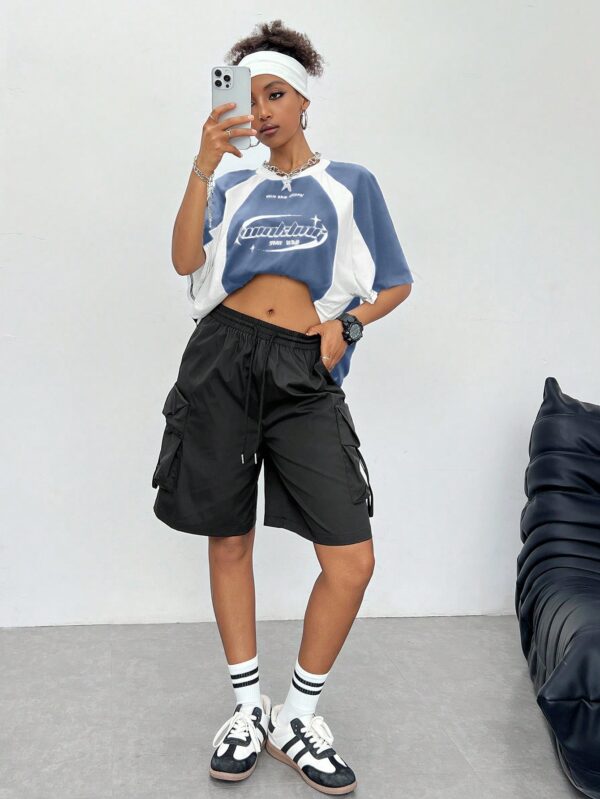 Remera Oversize Deportiva con Estampado de Bloques de Colores - Image 23