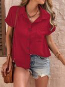 Camisa Negra de Manga Murciélago con Bolsillo y Botones