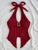 Camisola Negro Elegante con Hebilla Metálica y Dobladillo Asimétrico