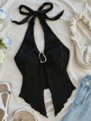 Camisola Negro Elegante con Hebilla Metálica y Dobladillo Asimétrico