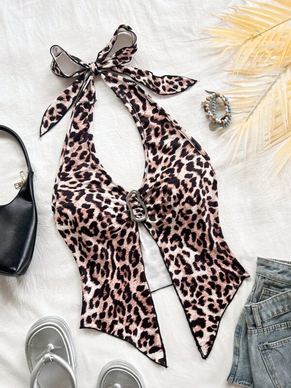 Camisola Negro Elegante con Hebilla Metálica y Dobladillo Asimétrico - Image 52