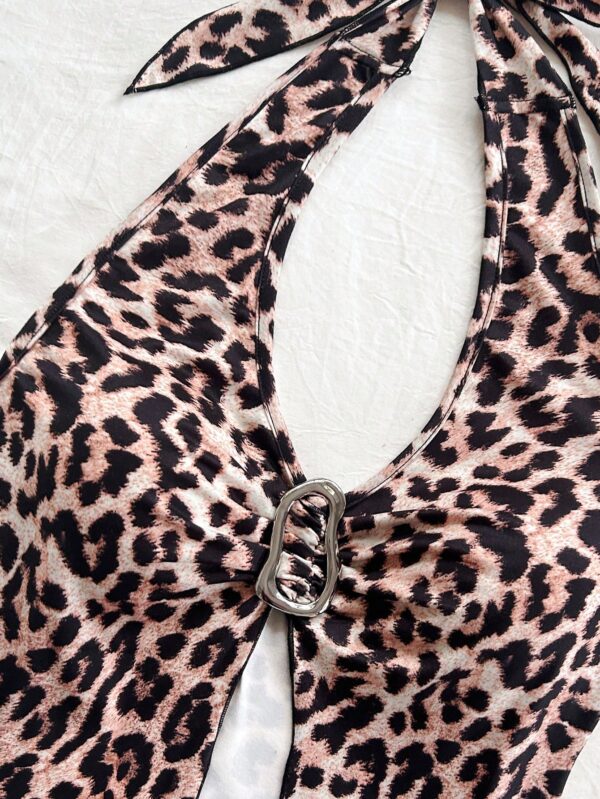 Camisola Negro Elegante con Hebilla Metálica y Dobladillo Asimétrico - Image 56