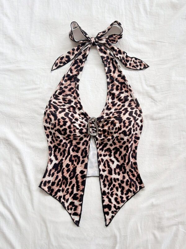 Camisola Negro Elegante con Hebilla Metálica y Dobladillo Asimétrico - Image 57