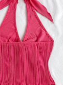 Camisola Negro Elegante con Hebilla Metálica y Dobladillo Asimétrico