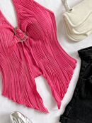 Camisola Negro Elegante con Hebilla Metálica y Dobladillo Asimétrico